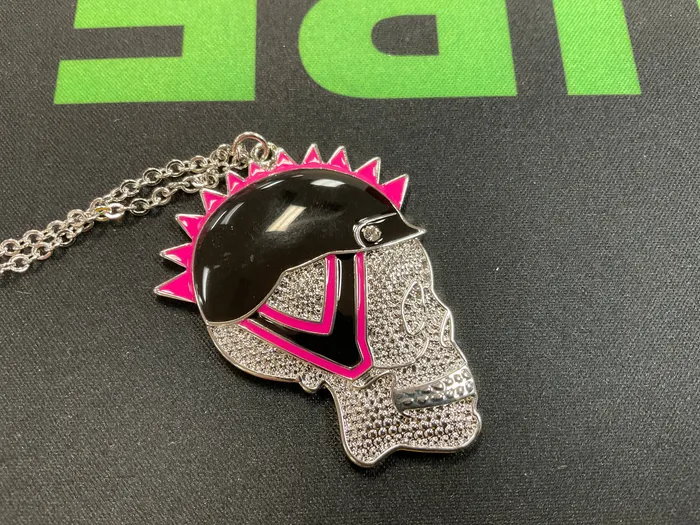 Vibrators go steel Pink biker skull necklace