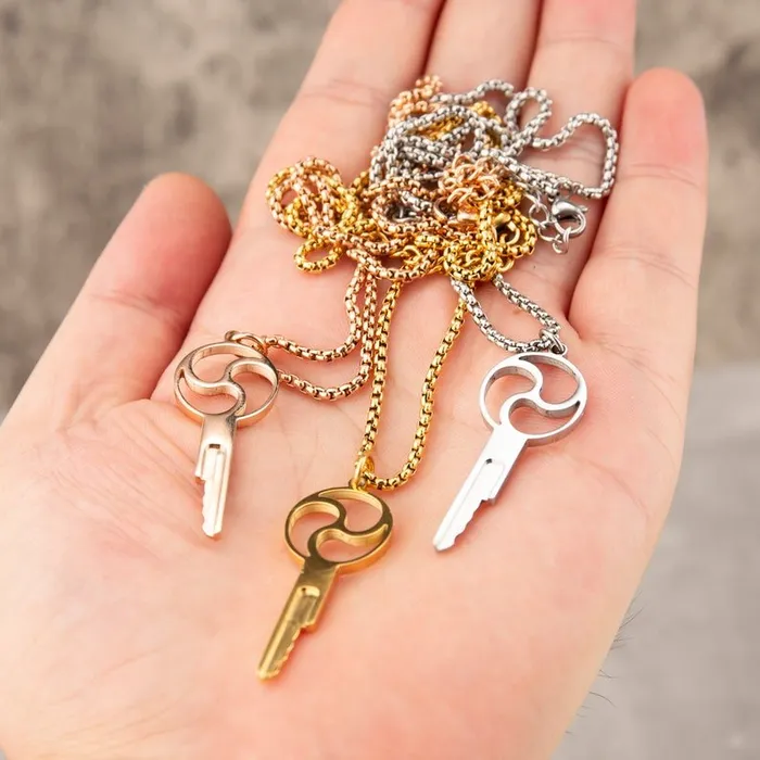 Oxyshop Male Sex Toys Triskelion Chastity Key Necklace Gold Steel